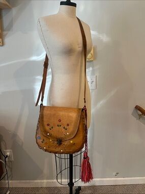 Leather bag made in Mexico tassel crossbody floral detail